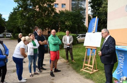 wspólnie porozmawiać o planowanej budowie nowego parkingu