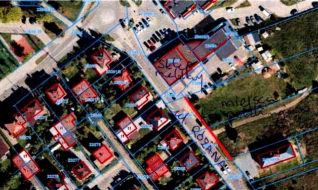 zaprojektowanie i wybudowanie w pasie drogowym miejsc parkingowych